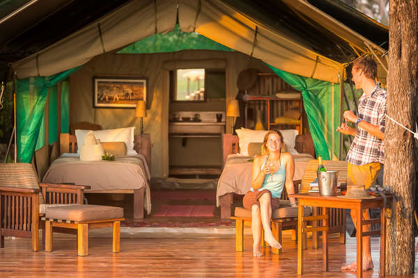 Guests resting at Macatoo camp in Botswana