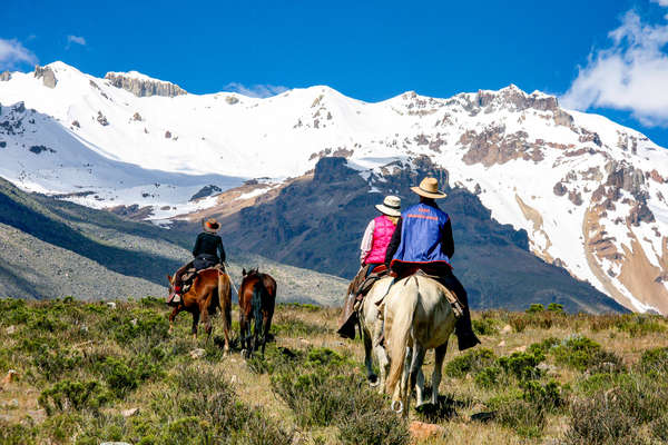 Horse and rider high up in the Andean mountains