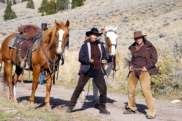 Riders becoming true cowboys in Idaho on a horse moving holiday
