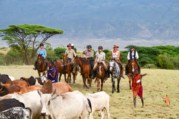 Riders following Masai farmers on a trail riding holiday