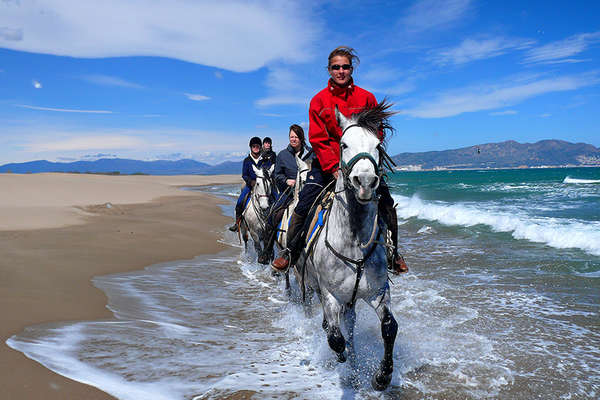 Riders on spain beach