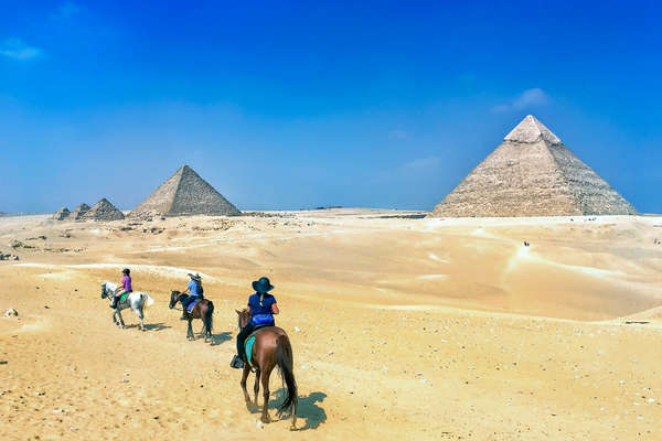 Trail riders on a horseback vacation in Egypt