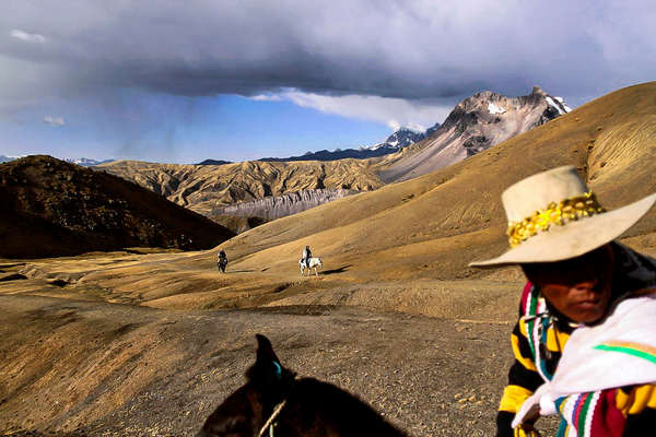 Trail riding on horseback in Peru