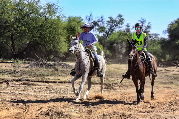 Two contestants in an endurance race on horseback in Namibia