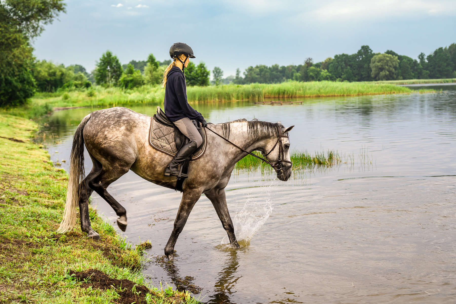 Rider entering the pond in the Galiny property