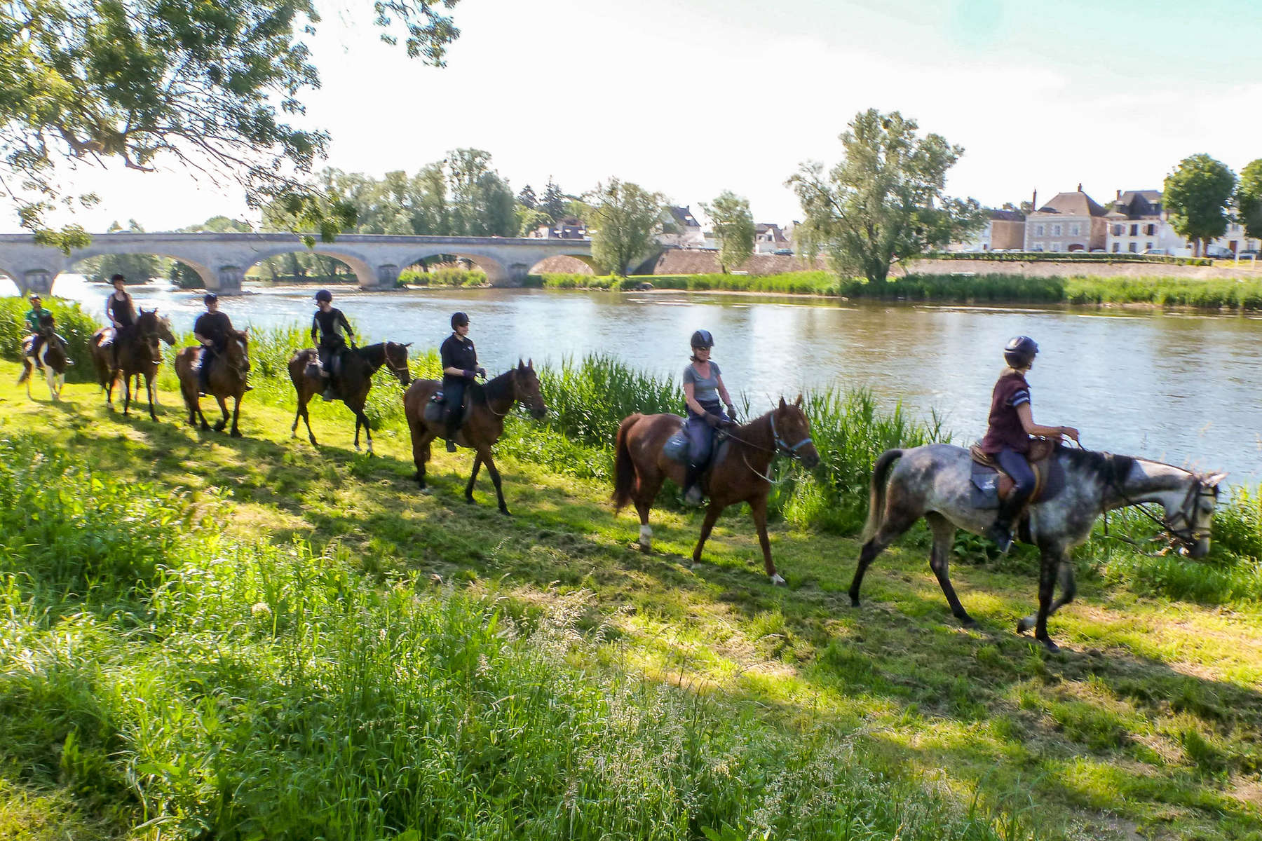 Riders in the Loire Valley along the Cher river