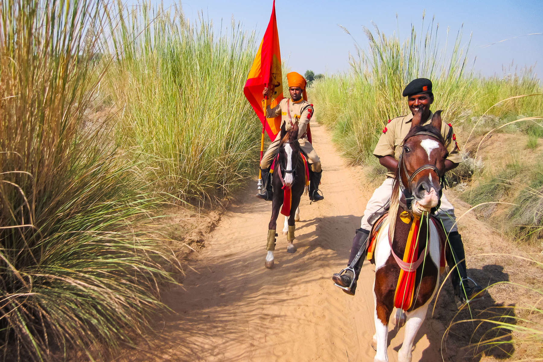 Two Indian riders riding Marwari horses