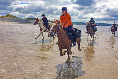 Beach riding in Wales with a nice canter