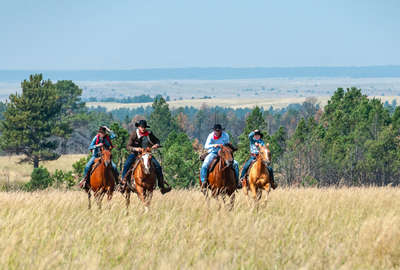 Cowboys racing in Wyoming