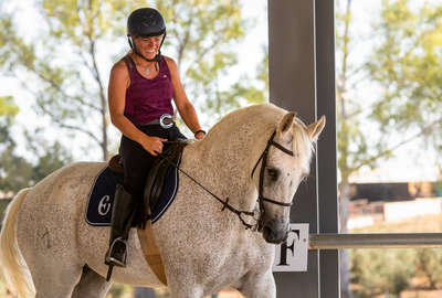 Dresage rider having a lesson in Spain at Epona Equestrian Centre