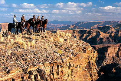 Fish River Canyon and horses in Namibia