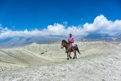 Rider on top of the Himalayas in Nepal