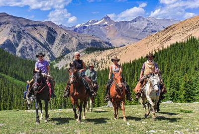 Riders on a pack trip adventure in Alberta
