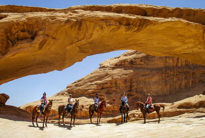 Riders posing for a picture in Jordan