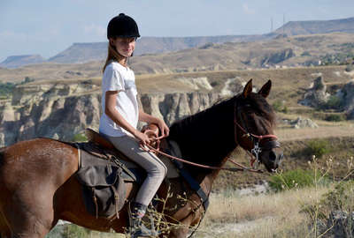 Young rider on a horseback vacation in Turkey