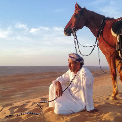 Bedouin and horse in Oman