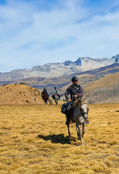 Riders walking along the Benasque Valley in Spain
