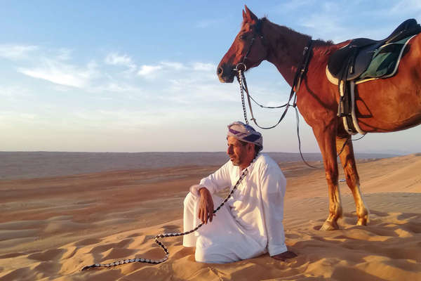 Bedouin and horse in Oman
