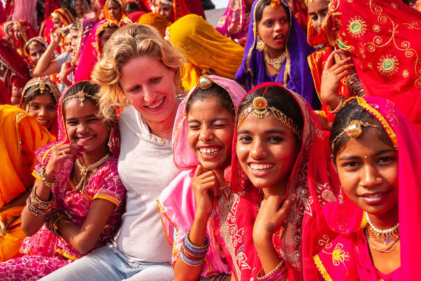European rider with young Indian girls