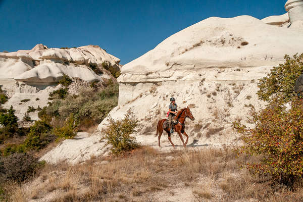 Horseback rider enjoying a trail riding holiday in Cappadocia, Turkey
