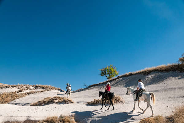Horseback riders in Cappadocia, central Turkey
