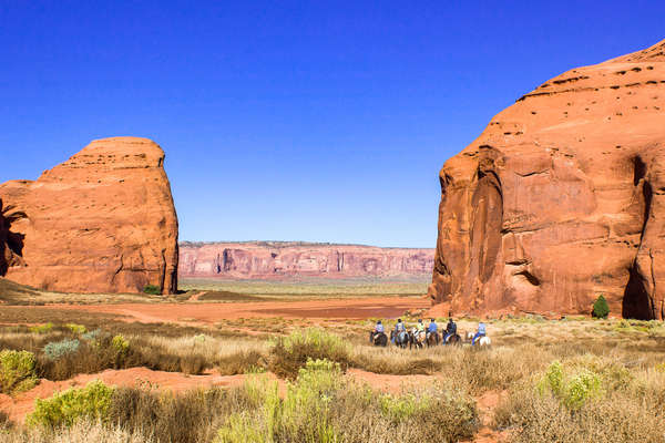 Horseback riders in the wondrous scenery of Utah and Arizona