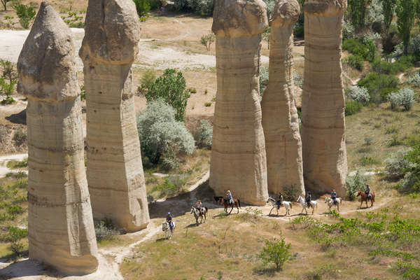 Horseback riders seen riding in the Love Valley of Cappadocia