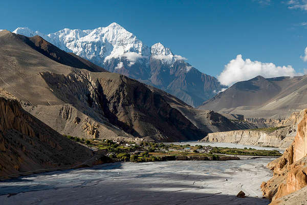 Mustang cliffs and Himalaya mountains 