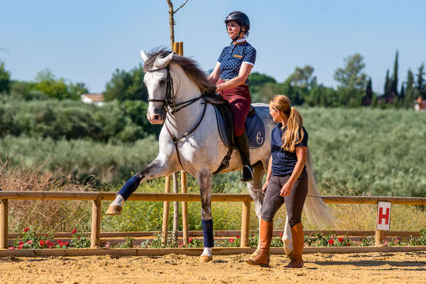 Rider enjoying a dressage lesson at Epona