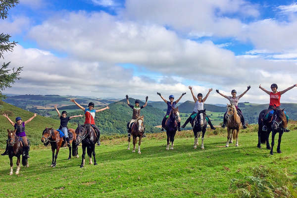 Riders and horses cheering, on a trail riding holiday