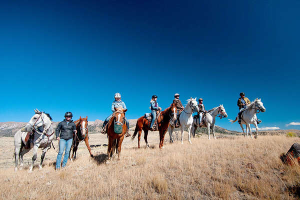 Riders and horses in Wyoming, USA