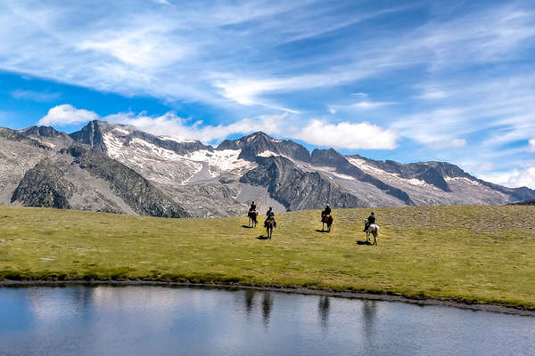 Riders in a valley in Spain