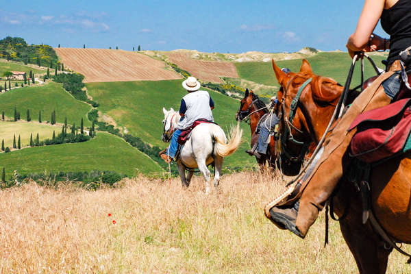 Riders in the hills of Tuscany