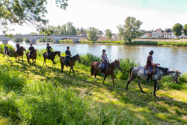 Riders in the Loire Valley along the Cher river