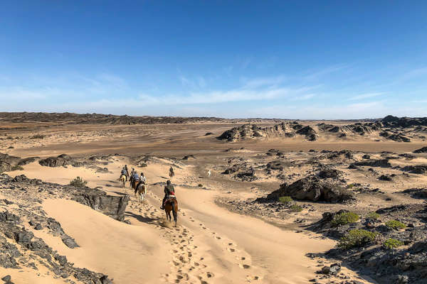 Riders on a trail in a Namiobian desert