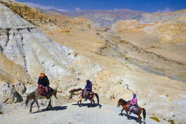 Riders on horseback in the Himalayas