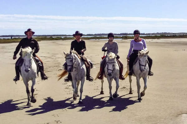 Riders on the beach in Camargue
