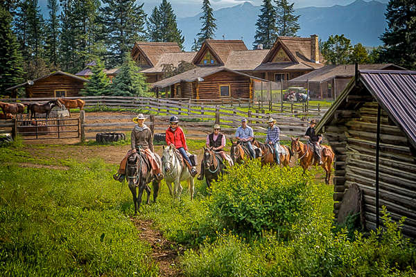 Riders setting out on a trail ride in Canada