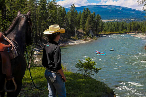 Riding and kayaking on a river in British Columbia