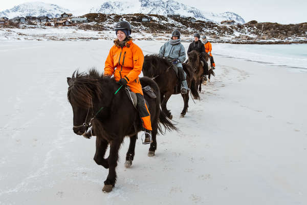 Riding in the winter on Vinje beach in Gimsøy