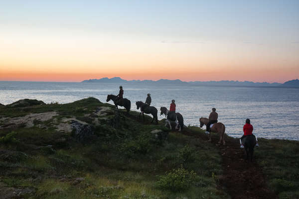 Riding out at sunset on Gimsøy island