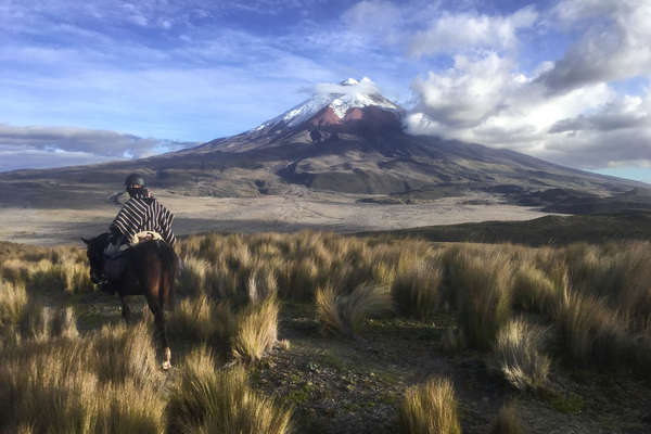 Riding riding towards Cotopaxi Volcano in Ecuador