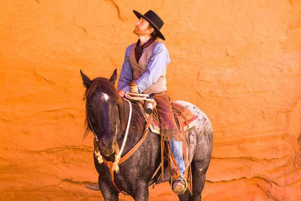 Trail rider riding a western horse in Navajo territory