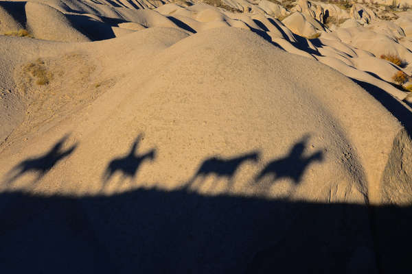 Trail riders shadow on a ride in Turkey