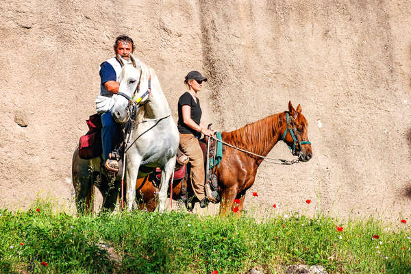 Western riders on horseback in Italy